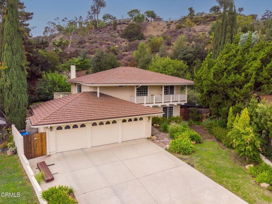 Welcome to this exceptional 4-bedroom, 3-bathroom home nestled in the desirable Oak Hill neighborhood. Perched atop a quiet cul-de-sac, this home offers privacy, breathtaking views, andsits on an expansive lot of nearly 27,000 square feet -- well over a half acre -- offering a rare blend of natural beauty and modern comfort. Set high on the hill, the property features a private staircase leading to a hillside deck, perfect forrelaxing or entertaining while taking in the stunning scenery. Beyond the deck, a meandering path invites you on a peaceful nature walk right on your own property. Mature landscaping includes a mix of crabapple, mulberry, oak, eucalyptus, and pine trees, along with a variety of fruit trees such as lemon, blood orange, peach, fig, and loquat. Drought-tolerant plants including ice plant, aloe, and agave add beauty and low-maintenance appeal, while bee and owl boxes encourage visits from local wildlife, adding to the property's unique charm.Inside, the home is bright, open, and filled with natural light. The beautifully remodeled kitchen is a standout, featuring custom cabinetry, quartz countertops, and a one-of-a-kind island with wine box drawer fronts -- a perfect combination of function and artistry. Enjoy exceptional views from two balconies -- a long front balcony and a spacious private balcony offthe primary suite -- ideal for morning coffee or sunset relaxation.The home also includes a spacious 3-car garage, offering ample storage, workshop space, or parking for multiple vehicles. Additional upgrades include a durable metal roof providing added wildfire protection, updated plumbing with additional cleanouts, a surge protective device, and upgraded electrical system with enhanced grounding. There may be room to park an RV or boat, room for an ADU, or the possibility of adding an EV charger. This is a rare opportunity to own a truly special home that combines the peace of nature with the convenience of modern living -- all in a sought-after location close to amenities, parks, and top rated schools.