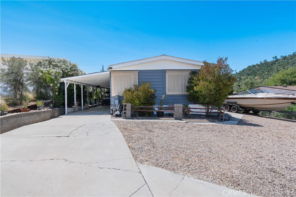 This one checks all the boxes—and it won’t last long! Discover a beautifully updated 2 bedroom, 2 bathroom home with over 1,400 sq. ft. of space in a gated, all-ages community packed with amenities—lake access, pools, parks, trails, and more. Inside, you'll find an inviting layout with a bonus family room and a stylish kitchen featuring wood countertops, stainless steel appliances, and a center island perfect for gathering. The spacious primary suite offers a soaking tub, separate shower, and dual sinks. Step outside to enjoy multiple outdoor living areas—a screened-in front porch, oversized deck with sunshade. The fully fenced backyard backs to a greenbelt and offers privacy with room to make it your own. Carport plus extra parking. Located close to schools, shopping, and dining—don’t miss your chance to make this one yours!