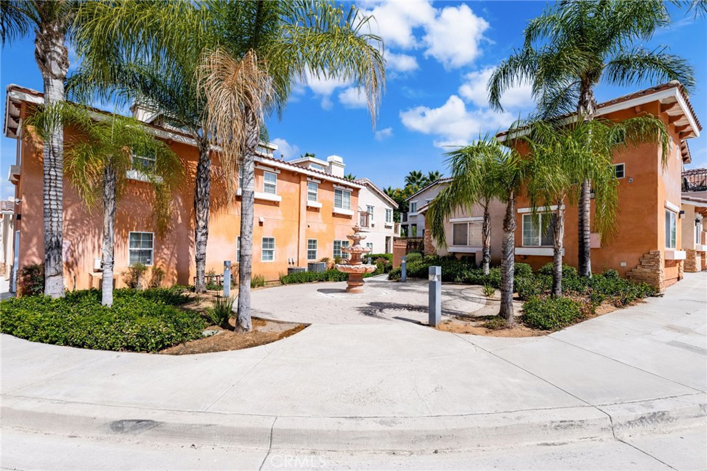 Turnkey luxurious condominium in the desirable Ziena Village Community in Redlands. Two large bedrooms with their own bathrooms upstairs and half a bath downstairs. High end upgrades and finishes including travertine flooring, granite counters and stainless steel appliances. Living room has a fireplace, dining room . Primary room has a balcony with poolside views. Remodeled bathrooms with granite counters, new glass shower doors. Custom railing. Private patio off of the dining room and kitchen. Available to purchase with all the furniture and the refrigerator. Close to downtown Redlands, schools and shopping.