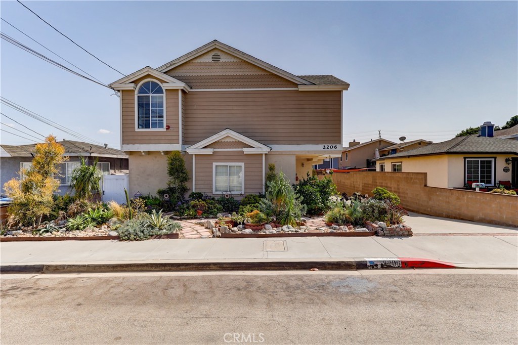 Great opportunity to transform this 3-bedroom, 3-bath, 2-story townhome into your own coastal masterpiece! Perfectly located in North Redondo Beach, just minutes from the sand, this home lives like a single-family residence with only 3 units in the complex on a quiet one-way street. The entry level offers 2 bedrooms, a full bath and a laundry room, along with direct access to an attached sizable 2-car garage with storage. Upstairs, the spacious living room features cathedral ceilings, filling the home with natural light and an airy feel. Large ensuite primary bedroom offers access to the balcony. Step out onto your private west facing balcony accessible from the living room to enjoy cool ocean breezes—ideal for relaxing or entertaining. A shared grassy yard in the back adds to the charm and community feel. Surrounded by vibrant restaurants, shopping, and entertainment, this townhome puts you in the heart of it all. Perry Park is steps away, Hermosa Beach Pier is only 2.4 miles, and LAX is a quick 7-mile drive. Endless potential to upgrade into your dream home. Great layout, structurally sound. Here’s your chance to get into this incredible beach community at a fantastic value—bring your vision and make this charming townhome your own!