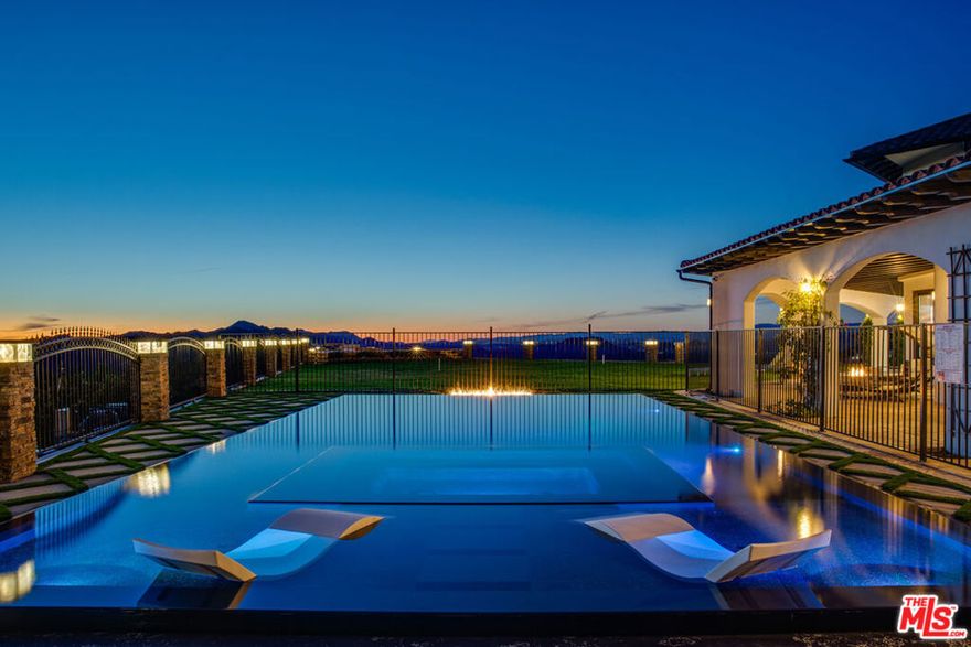 *Available long or short term, prices vary based on availability & furnished/ unfurnished .* Welcome to Piuma Rd in sunny Malibu California. This estate sits atop 9 acres of land with views as far as the eye can see. Featuring 7 bed and 6 baths, our home is perfect for entertaining purposes or a cozy night in. The backyard includes outdoor kitchen/ barbecue, lots of green grass, panoramic views from mountaintops to oceans, and of course your own heated pool. Ceilings soar at 20ft high, giving a spacious feel throughout the home. Travertine floors and gorgeous chefs kitchen open layout includes granite countertops accompanied by a breakfast bar and dining area, as well as walk in pantry and built in wine rack and a guest wing with a separate entrance that works well as a maid's quarters or in-law suite.Other features include a huge game room complete with bar and outdoor deck access, a safe, office, covered and uncovered parking fitting up to 50 cars, and hiking trails. Views can be seen from almost every room reminding you of the endless possibilities that come with living here. This property can be delivered furnished or unfurnished. Move in ready!