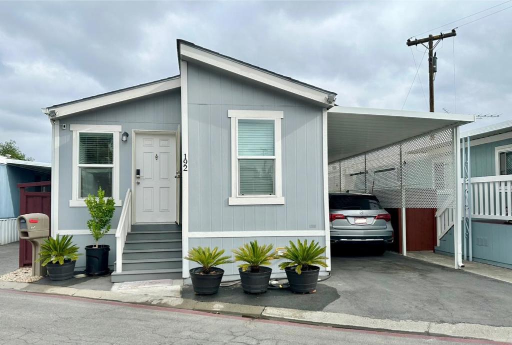 Welcome to this charming 3-bedroom, 2-bathroom, newer home, year 2023 in the vibrant city of San Jose. Spanning 1,007 square feet, this home offers a cozy yet functional living space. The kitchen is a highlight, equipped with modern amenities including a dishwasher, garbage disposal, refrigerator, and an island with a sink, making it a great space for meal preparation and entertaining. You'll appreciate the convenience of the dining area, located within the living room, which is perfect for intimate gatherings. The home features central forced-air heating and a window/air conditioning unit for cooling, ensuring comfort throughout the seasons, and offers the practical benefit of an in-home washer and dryer for laundry needs.