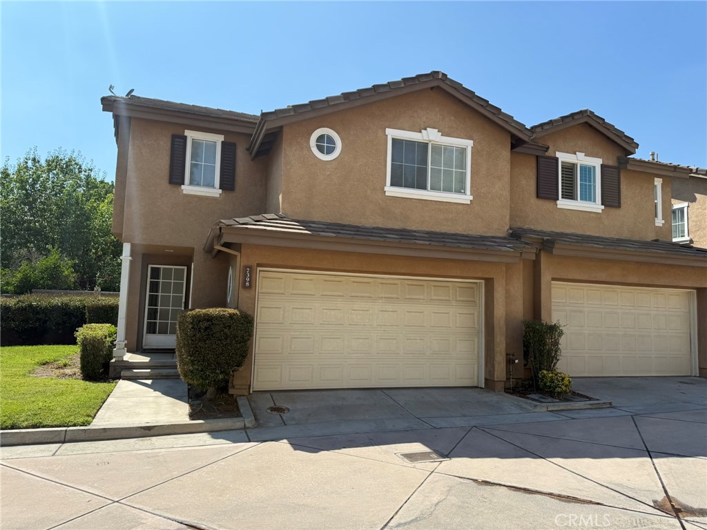 Three-bedroom, two-bath home in this awesome community featuring a pool and playground. Located at the end of a quiet cul-de-sac with a unique, nice front yard. This home welcomes residents with a high ceiling at the entrance, enhanced by a large window, leading to a cozy family room with a fireplace, open to the kitchen. The house has fresh paint and new flooring in the living room and family room. All rooms and hallways have laminate flooring. The main bedroom is extra large with an attached full bathroom featuring a separate tub and shower, as well as dual sinks. A laundry room is conveniently located upstairs between the bedrooms. The house has a two-car garage. Community parking is available right outside the front yard.