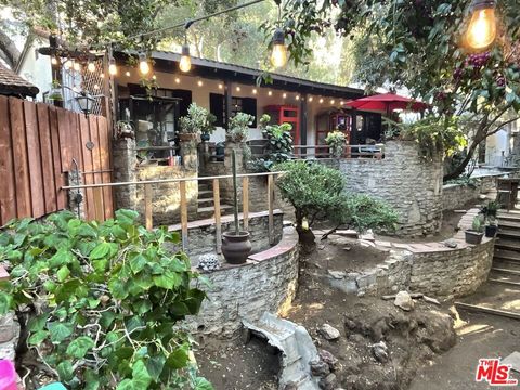 Photo of 8757 Wonderland Park Avenue, Los Angeles, CA 90046 (MLS # 26638119)