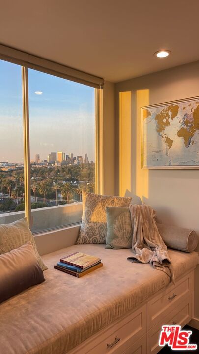 Just one block from Beverly Hills, this fully furnished corner unit at the iconic Doheny Plaza offers sweeping city views and elevated living in a recently renovated full-service building. Residents enjoy 24-hour security, valet parking, concierge service, on-site management, a state-of-the-art fitness center, and a sparkling pool. The stylish interior features stainless steel Viking appliances, custom cabinetry, sleek contemporary flooring and countertops, recessed lighting, and a spa-inspired primary bathroom. The open-concept living area flows onto a large private balcony ideal for relaxing or entertaining against a stunning city backdrop. Smart-home features include central A/C with a Nest thermostat and built-in Sonos speakers. Laundry is conveniently located on the same floor, and rent includes all utilities, water, power, and access to all building amenities including parking. Perfectly positioned at the intersection of Beverly Hills and West Hollywood, Doheny Plaza places you moments from world-class dining, luxury shopping, five-star hotels, parks, and the iconic Sunset Strip.