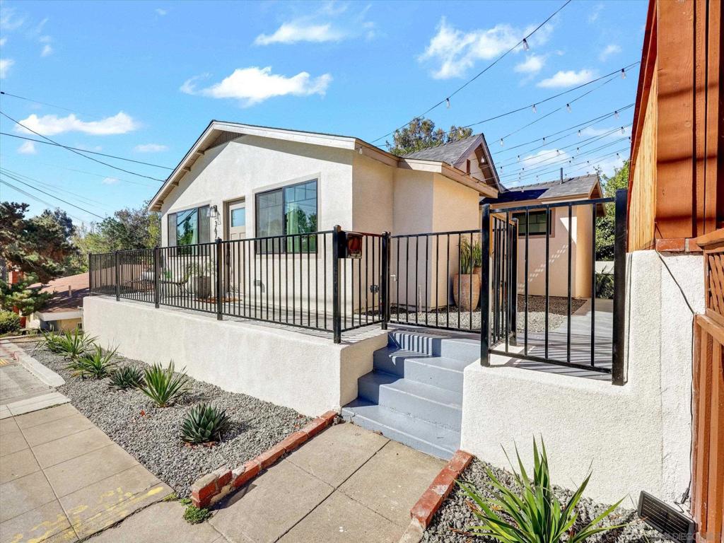 Sophisticated Urban Luxury in the Heart of Hillcrest! Step into modern elegance with this exquisitely remodeled 2-bedroom, 2-bath single family residence, perfectly situated in one of San Diego’s most coveted walkable neighborhoods. Every detail of this complete renovation has been meticulously curated to deliver refined style, timeless sophistication, and effortless comfort. The open-concept floor plan showcases designer finishes, wide-plank LVP flooring, custom cabinetry, and a chef-inspired kitchen featuring quartz countertops, high-end stainless steel appliances, Forno chef quality gas range- pot filler and elegant lighting. Both bathrooms have been reimagined with spa-quality materials and contemporary fixtures, creating a serene retreat for daily indulgence. Enjoy the ultimate in convenience and lifestyle—just steps from Hillcrest’s and premier dining, upscale shopping, and vibrant nightlife, as well as Balboa Park and the world-renowned San Diego Zoo. Walk or bike every Sunday to Hillcrests Farmers Market. With its exceptional Walk Score and central location, this residence embodies luxury urban living at its finest. Discover the perfect balance of sophistication and city energy—a truly turnkey home designed for the discerning buyer. **Possibilities are endless with approved ADU plans and additional office/ workshop studio below with full spa bath and kitchenette.
