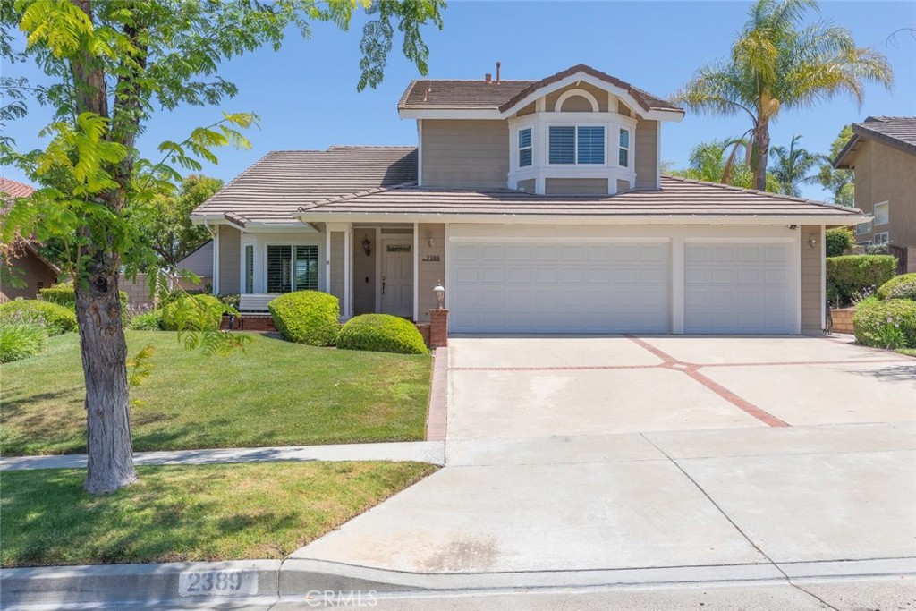 Welcome to this beautifully maintained home nestled in the heart of Corona, offering the perfect blend of charm, comfort, and resort-style living. Featuring 3 bedrooms and 2.5 bathrooms, this thoughtfully upgraded residence is sure to impress from the moment you arrive. The home’s stunning curb appeal sets the tone, while vaulted ceilings and tile floors welcome you into an inviting interior filled with natural light. Newer vinyl windows with classic window shutters, elegant wainscoting accents, and custom built-ins add warmth and character throughout. Remodeled bathrooms and ceiling fans in every room enhance both style and comfort. Step outside to your own private paradise. The backyard is a true entertainer’s dream—boasting a sparkling crystal-clear pool and spa, a large patio cover for shaded lounging, and a built-in barbecue island perfect for weekend cookouts. Surrounded by lush greenery and swaying palm trees, this outdoor space offers a serene and tropical setting that feels like a personal oasis. With its desirable location, quality upgrades, and an outdoor space designed for unforgettable moments, this Corona gem is ready to welcome you home.
