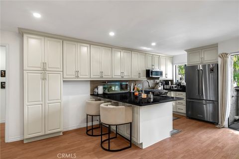 Photo of 18530 Hatteras Street #213, Tarzana, CA 91356 (MLS # SR26002317)