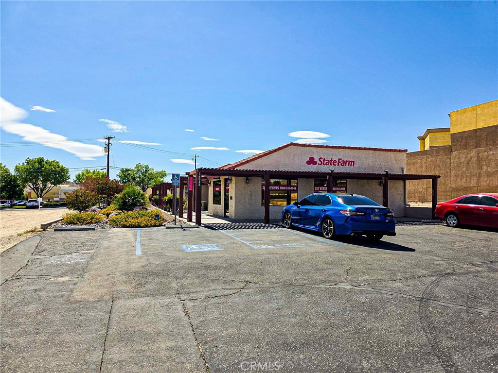 Now available for lease is Suite 4, a ±640 square foot professional office space located within a multi-tenant building in the heart of Apple Valley. The suite features an open floorplan with a private restroom, offering flexibility for a variety of office, administrative, or creative uses.
Situated just blocks from the busy intersection of Apple Valley Road and US Highway 18, this location benefits from excellent visibility and access. The property is also in close proximity to St. Mary Medical Center and numerous surrounding medical and professional offices.
Offered at $1.40 per square foot MG ($900/month).