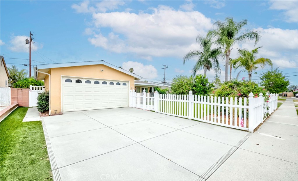 Stunning single-story home in the heart of Anaheim! This well-maintained 3-bedroom, 2-bath residence features vaulted ceilings, ceiling fans throughout, and oversized windows that bring in an abundance of natural light. The functional layout offers ample built-in storage and a bright, welcoming living space. Thoughtful upgrades completed in recent years include a newer roof, dual-pane windows and doors, HVAC system, updated kitchen, and a newer garage door with automatic opener. The home is also equipped with a tankless water heater, water softener, drinking water filtration system, EV charger installation, and a fully paid-off solar panel system—providing energy efficiency and long-term savings. Step outside to enjoy the private in-ground pool with upgraded equipment and skimmer pipes, or unwind on the front patio featuring an overhang, white picket fence, and low-maintenance synthetic turf. Located just minutes from parks, golf courses, shopping, and Disneyland, this home offers the perfect combination of comfort, convenience, and California lifestyle.
