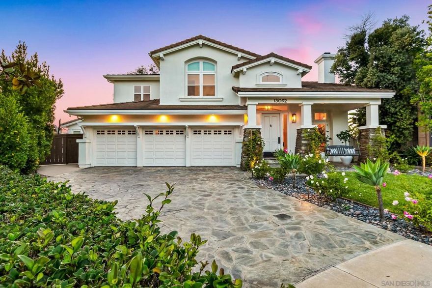 Welcome to 13092 Harwick Lane, a modern showpiece tucked away in the highly sought after Private Collection of Carmel Valley. Perfectly positioned at the end of a quiet cul-de-sac on one of the community’s largest and most private lots, this home blends luxury, function, and resort-style living. Step inside to discover over $500,000+ in high-end upgrades including new windows and doors, custom millwork, designer lighting, Theatre room and contemporary finishes throughout. The open-concept floor plan offers a main-level guest suite with its own living room and private entrance, ideal for extended family or guests.   The chef’s kitchen is the heart of the home, featuring Viking appliances, an extended island, wine refrigerator, and breakfast nook that flows seamlessly into the spacious family room with custom built-ins and a cozy stone fireplace. Enjoy additional lifestyle spaces including a private theatre, home office, and versatile indoor and outdoor living areas designed for entertaining.  Upstairs, the primary suite impresses with a fireplace, lounge area, dual walk-in closets, and a spa-like bath adorned with Italian Carrera marble, dual vanities, and a freestanding soaking tub.  The resort-inspired backyard is an entertainer’s dream with a pebble-tec pool, spa, slide, waterfall, and putting green surrounded by lush landscaping and multiple lounge areas. Paid solar ensures energy efficiency, while the secluded cul-de-sac setting offers ultimate privacy and tranquility, creating a rare opportunity in Carmel Valley’s premier enclave.