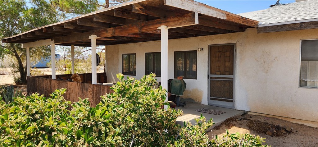 My Sellers are motivated and have adjusted the price on this two-bedroom home plus den to sell quickly. It has a full-sized attached garage, fenced yard, and incredible 360-degree views. It’s a fantastic opportunity to complete the renovations the owners started—permits were pulled but never finalized. You can transform this place into the desert home you've been dreaming of by taking full advantage of the beautiful, peaceful desert surroundings. The night sky is so full of stars that it feels like you can touch them, and just earlier, the sunset put on a show just for you. It’s easy to see why more people, artists, and musicians are leaving the hustle of city life behind and discovering all that the Joshua Tree/Landers area offers. This home has been expanded thoughtfully, providing you with ample space to feel comfortable while also accommodating your guests. The outdoor area is filled with native plants and has plenty of space for whatever you can imagine! Please call for a tour and get ready to create. Cash or FHA 203K loan.