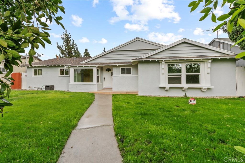 Absolutely Move-In Ready! Welcome to this beautifully updated 3-bedroom, 2-bath home featuring a detached legal ADU with its own address (10452 Balboa). The main house has been completely remodeled and showcases a brand-new kitchen, modern appliances, elegant bathrooms, new flooring, updated lighting, and fresh paint throughout. The formal living and dining areas feature a unique fireplace and abundant natural light, creating a warm and inviting space for both relaxing and entertaining. The kitchen is a true highlight, boasting new cabinetry, quartz countertops, stainless steel appliances, and a cozy breakfast nook. All bathrooms have been tastefully redesigned and remodeled.  The primary suite offers hardwood floors, a spacious bathroom, and ample closet space, providing comfort and style.  Step outside to a backyard built for entertaining, ideal for gatherings of all kinds. The large lot also provides room to add a Junior ADU for future expansion.  The property unique feature is a detached legal ADU with its own legal address.  The detached ADU includes a remodeled kitchen and bathroom, along with an outdoor sitting area, making it perfect for guests or rental income.  Conveniently located near shops, restaurants, and freeway access, this property truly has it all. Don’t miss this amazing opportunity — a must-see home!