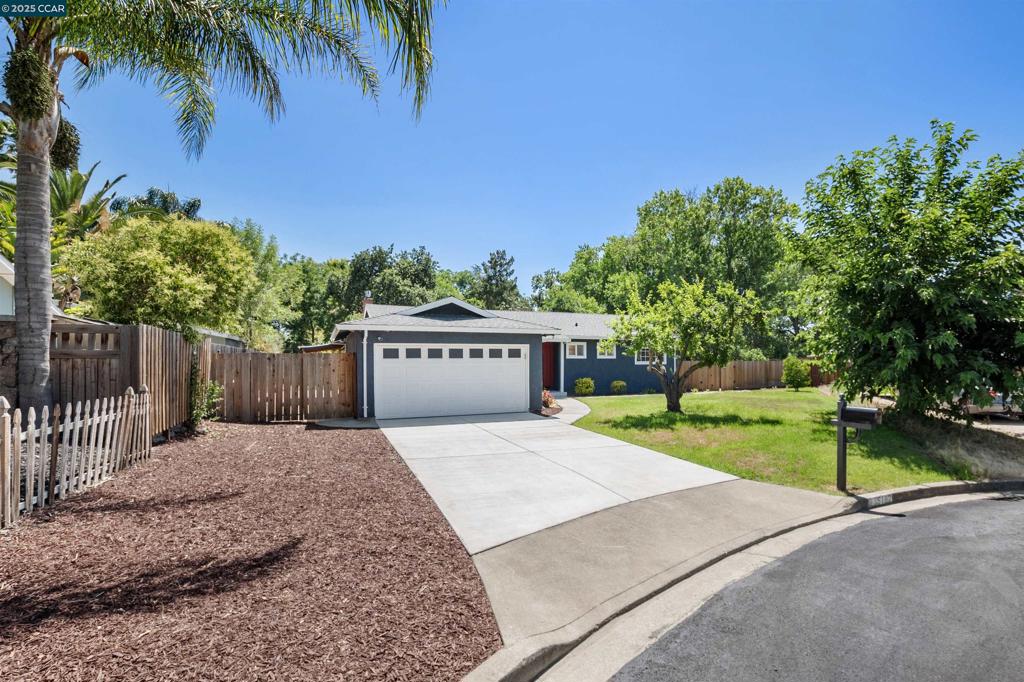 Tucked at the end of a peaceful cul-de-sac in one of Concord’s most sought-after neighborhoods, this stylishly updated 3-bedroom, 2-bath rancher is the kind of home that’s hard to find and easy to fall for. Step inside to a spacious open floor plan where the heart of the home—the kitchen—shines with a large quartz island, brand-new Frigidaire appliances, and clean, modern finishes. It flows effortlessly into the dining and living areas, making it ideal for everyday living and entertaining alike. Custom accent walls and thoughtfully designed bathrooms add a high-end touch, while the generous lot—nearly half an acre—offers rare outdoor space. Out back, enjoy a sparkling pool, lush landscaping, and a private path leading to a serene creekside escape. The expansive yard also provides excellent potential for an ADU, with plenty of flat, usable space to bring your vision to life. Fully owned solar adds energy efficiency and long-term savings. Whether you’re hosting summer get-togethers or simply relaxing after a long day, this home offers the perfect balance of comfort, style, and setting—all in a location that feels tucked away but still close to everything.