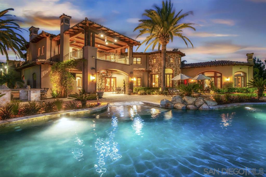 This is the estate with the ultimate views in prestigious, highly coveted Rancho Pacifica! Set at the pinnacle of Rancho Pacifica's most sought after street, this estate presents the enviable lifestyle for those who want every luxury afforded to them. Breathtaking panoramic ocean, golf course, mountain, valley, and lake views coupled with all usable acreage distinguishes this property from all others. Extraordinarily private and serene, this custom designed and perfectly executed property has it all! The fabulous Master Suite plus 2 other very, very large bedroom suites enjoy the main level, along with the handsome Executive office, formal Dining, Large Family Room with massive fireplace, soaring ceilings, and a direct sit down view of the Pacific Ocean, stunning kitchen, 8-seat professional Theatre, Billiard/Game room, Wine room, The upper level boasts 2 additional very large bedroom suites, the home's 2nd indoor Family Room and capacious balconies await. Disappearing walls of glass seamlessly transition to the home's outside paradise providing for CA year round living at its finest! Enormous resort style pool/spa, professional putting green, alfresco dining/cooking station, luscious lawns, mature well placed landscaping--all accessed from the home's spacious outdoor Family Room and all enjoying never ending VIEWS!! Beautiful stone clad private Entry with wrought iron doors, handsome fireplaces in the Master, Executive Office, Formal Living, first floor indoor and outdoor Family rooms; stunning use of stone and wood, designer lighting throughout, tremendous storage plus an oversized 5-car garage help ensure optimum living. Come see the very best estate within Rancho Pacifica---San Diego's most ideally and conveniently situated residential community. Equipment: Garage Door Opener,Pool/Spa/Equipment Sewer: Sewer Connected Topography: LL