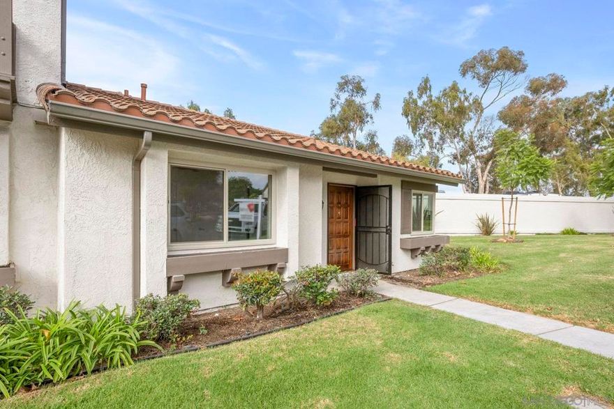Beautifully Remodeled Home in Las Playas - Just Minutes to the Beach! This stunning 2 bed, 2 bath home with a 2-car garage has been significantly remodeled from top to bottom. Step inside to find brand-new windows, sleek 24"x12" modern flooring, and a bright, open layout designed for both comfort and style. The updated kitchen features all-new appliances, while the inviting family room is highlighted by a cozy fireplace, perfect for those cool coastal evenings. Enjoy your own private enclosed backyard and patio, ideal for entertaining or unwinding in the fresh coastal air. Located in the highly desirable Las Playas community, you'll have access to resort-style amenities including sparkling pools, relaxing spas, basketball courts and tennis courts. And the location couldn't be better -  just a short walk or bike ride to Ponto Beach, shopping, dining, and the Poinsettia Dog Park. This home has it all: style, comfort, and the ultimate Carlsbad lifestyle!