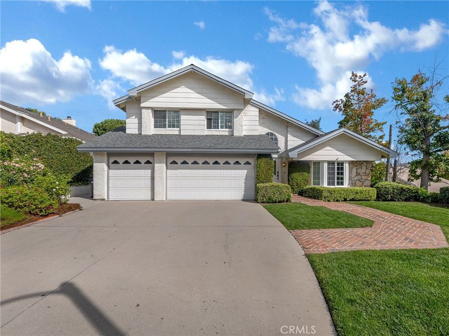 Located in the heart of Agoura Hills.  This is a Spacious 4 bedroom 3 bath home. Versatile downstairs bedroom can be used to fit so many needs. Attached 3 car garage provides so much storage. Grassy Backyard features a sitting area overlooking stunning Mountain views. Freshly painted walls with vaulted ceilings. Quick walk to Reyes Adobe Park, close to the 101 Freeway, and situated in Las Virgenes School District makes it a great place to make your home