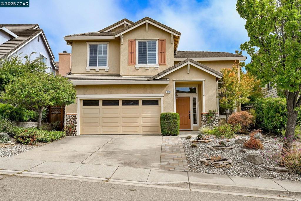 Step into comfort and style in westside San Ramon's sought-after Deerwood community. This 4 bedroom, 2.5 bath home offers over 2,000 square feet of thoughtfully designed living space. You're greeted by soaring ceilings, rich engineered hardwood flooring, and an abundance of natural light flowing through the expansive formal living and dining areas. The bright kitchen has been tastefully updated with brand-new quartz countertops, crisp white cabinetry, and a sleek stainless steel French-door refrigerator. It opens seamlessly to the family room with a cozy pellet stove fireplace insert. Plush new carpeting leads upstairs to the 4 bedrooms including a generous primary suite offering hillside views and a luxurious ensuite featuring a soaking tub, separate shower, dual vanities, and an enormous walk-in closet. Enjoy a beautifully landscaped, drought-tolerant front yard and the private backyard, which backs to open space for extra peace and privacy. Lots of garage storage! Just one mile from I-680, this stunning home offers excellent commuter access while close to award-winning San Ramon Valley schools, neighborhood parks, scenic Las Trampas hiking trails, shopping, Costco, and dining. Don't miss this opportunity in an unbeatable location!