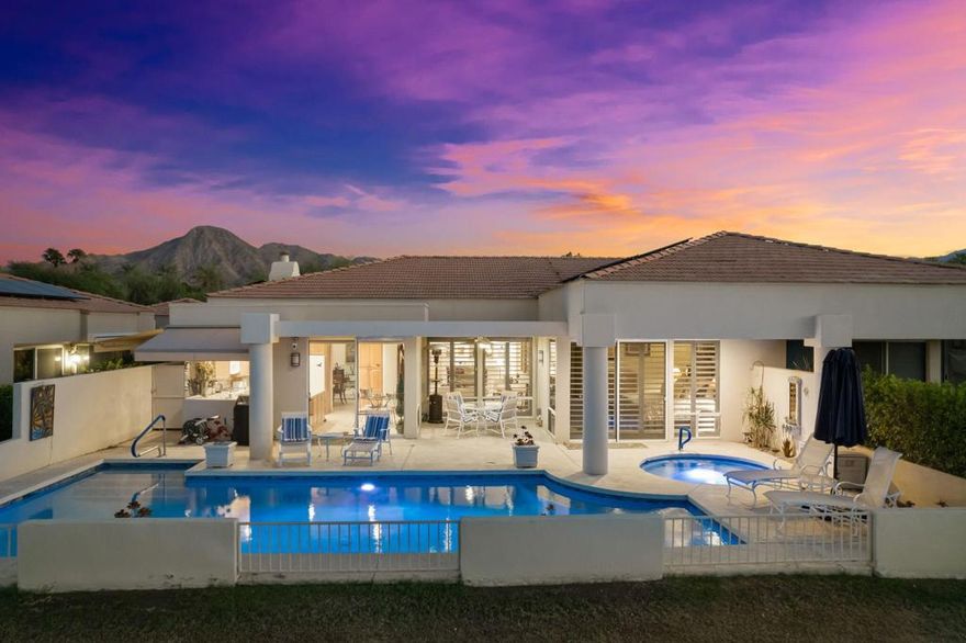 Leased Nov.. - March 2026.Gorgeous Fairway, Lake and Mountain Views are yours from this beautifully maintained Desert Horizons Pool home. As you enter the gated courtyard you are welcomed into this ever popular Troon floor plan offering 2 Master Suites and a Home Office. An open floor plan perfect for entertaining and lots of natural light from the walls of windows that overlook the Pool and Fairway. Features; Tile and Wood flooring throughout the home, ceiling fans in each room and plantation shutters. Living room has a cozy fireplace, Family Room has a Flat Screen TV with an adjacent Wet Bar with stools and a bar refrigerator. Dining area for 6. The Chef's Kitchen has rich wood Cabinetry, updated Appliances, harmonizing granite countertops, a wine cooler and a Breakfast Nook with a flat screen TV. Spacious Master Suite with spa-style bath, dual vanities, King bed with TV and a generously sized custom walk-in closet. 2nd Guest Master Suite features a King bed with TV and has its own private patio, en-suite bath and walk-in closet. The Home Office offers a custom built-in Desk and cabinets with views out to the Courtyard. An additional 3/4 bath, spacious laundry room and a 3 car garage complete the home. What a better way to entertain on your back Patio enjoying the beautiful sunsets and your own private sparking Pool and Spa, awnings and BBQ or watch the golfers go by on the beautiful #17 Fairway at this premiere Indian Wells location.