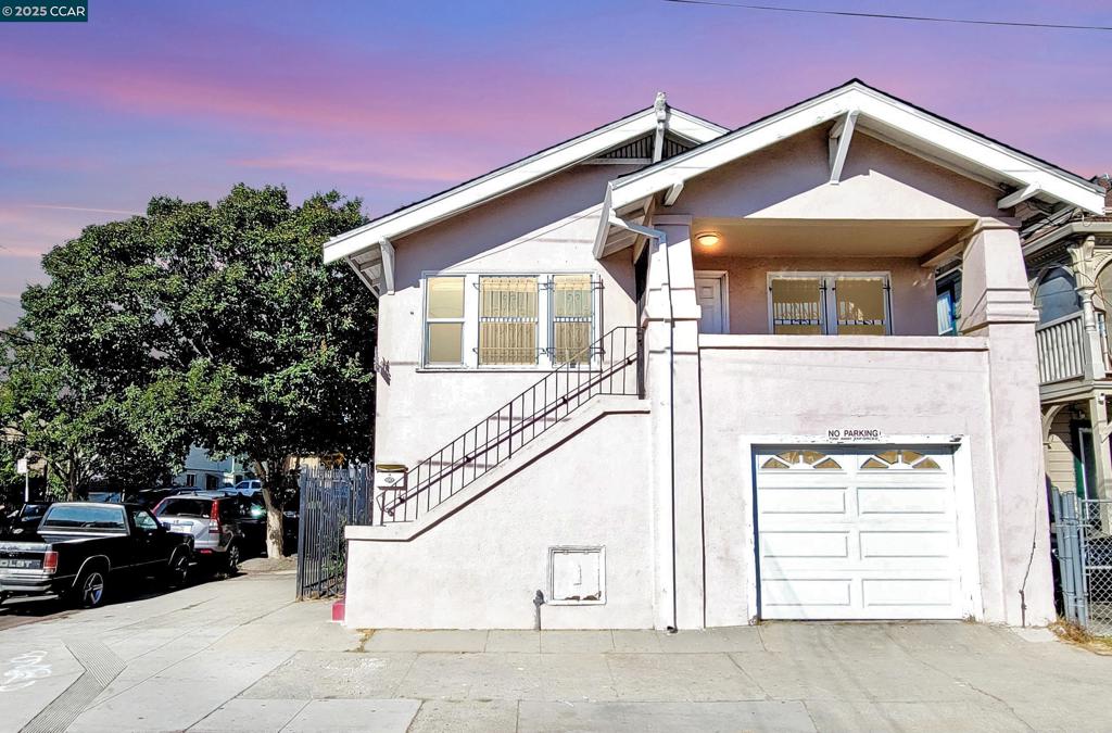 Spacious Oakland Fixer-Upper – Perfect for Large Families or Savvy Investors! This two-story property offers incredible potential and flexibility — ideal for a large family, multi-generational living, or a smart investor looking for a value-add opportunity. This property is 1,647 SqFt with two separate one car garage's. The upper level features newly installed laminate flooring throughout, 4 spacious bedrooms, 2 full bathrooms, a full kitchen, dining area, and a bright living room. The lower level includes 3 additional bedrooms, 1.5 bathrooms, a laundry room, a second family room, and a second kitchen — perfect for in-laws, guests. With a little TLC, this fixer-upper can be transformed into a beautiful home or a high-performing investment property. Sold as-is, this property is priced right for its potential. Don’t miss out on this rare opportunity in Oakland!