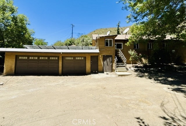 This home offers three bedroom and two bathrooms. It is located in the City of Lake Hughes . it is 1218 Sq ft and sits on a lot that is 2.9 acres. There is a Living and dining room areas a three car garage and a laundry area. A must see!
