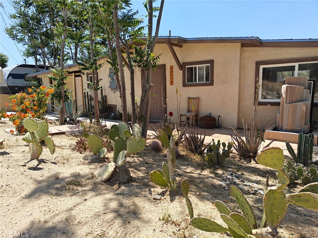 Escape to the peaceful beauty of Morongo Valley with this inviting 2-bedroom, 1-bathroom home nestled on a spacious 990 sq ft lot in San Bernardino County. Whether you're looking for a cozy primary residence, weekend retreat, or investment opportunity, this desert gem offers endless potential. Set against a stunning high desert backdrop, this property offers the tranquility of rural living while being just a short drive to Joshua Tree, Yucca Valley, and Palm Springs.