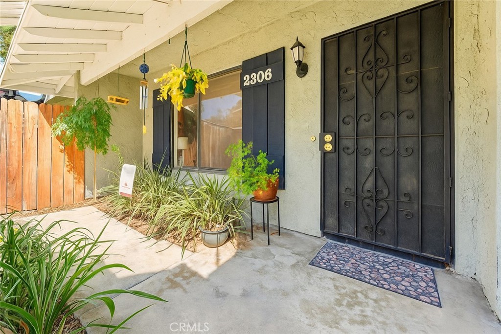 Turn-key and stylish! Discover comfort, convenience, and community in this beautifully updated 2 Bedroom 1.5 Bath home, that's nestled in the highly sought-after Corsican Family Village, a perfect place to call home. Step inside and be greeted by a bright floor plan filled with tons of natural light, that showcases the Luxury Vinyl Tile flooring. The large living room area is designed perfectly for everyday living and entertaining, making hosting effortless, it flows seamlessly into the updated kitchen. A functional kitchen that features recently updated appliances including refrigerator with an added water line, a built-in microwave, dishwasher and garbage disposal making mealtime preparation a cinch. The bathrooms, both downstairs and upstairs have been thoughtfully updated with improved plumbing for everyday use and peace of mind. Recently upgraded HVAC system, central air, furnace, added additional ductwork, removed hazardous attic insulation and replaced with new high efficiency insulation. Also, installed an energy efficient Google Nest Eco thermostat. These upgrades will provide long lasting value and year-round comfort. Enjoy your private patio complete with space for outdoor dinning or play, plus a storage closet and water heater closet with new water heater. The spacious primary bedroom offers endless versatility, currently enjoyed as a home office, but easily adapts to your needs while providing plenty of room to relax. Both upstairs bedrooms feature walk-in closets, adding comfort and convenience. Outside, you will find a one car garage with built-in storage and laundry hookups, plus an additional uncovered parking space for a second vehicle. The well maintained HOA community offers amenities including a sparkling pool, tot lot, and a green recreational area all perfect for creating lasting memories right outside your door. Located in the highly regarded Orange Unified School District and just minutes from the 22 and 55 freeways, this condo provides easy access to schools, shopping, dining, and commuting routes. Don't miss your chance to own this inviting, move-in ready home that offers space that lives larger than its footprint in one of Santa Ana's most welcoming neighborhood.