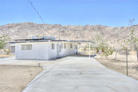 Photo of 67446 Appian Road, 29 Palms, CA 92277 (MLS # JT26123255)