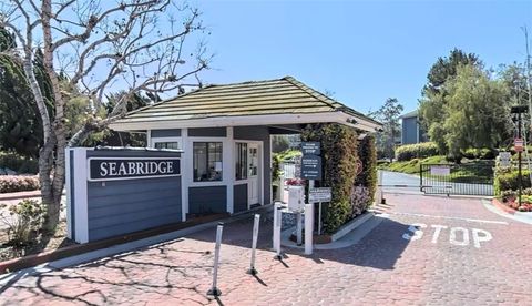 Photo of 20251 Sealpoint Ln #101, Huntington Beach, CA 92646 (MLS # OC25279421)