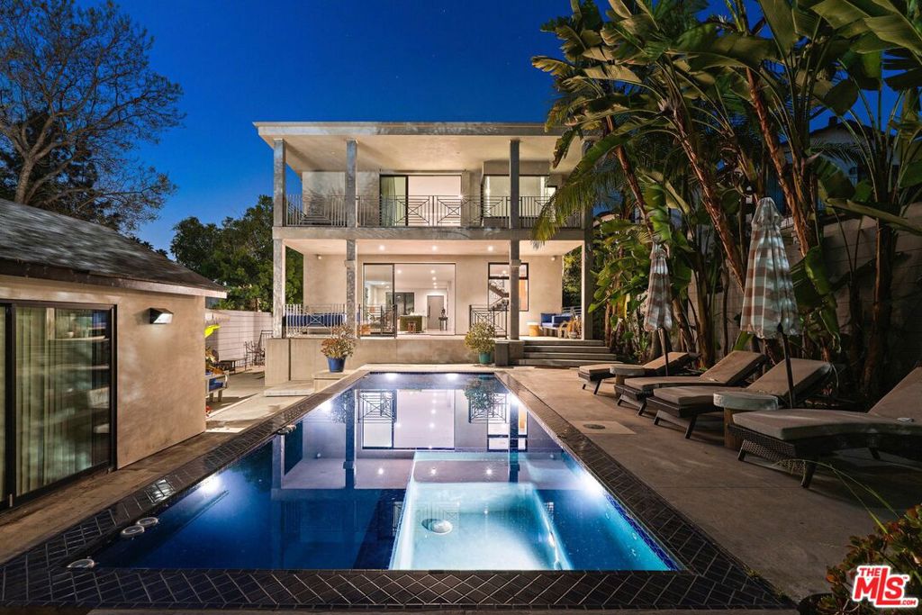 Available now newly furnished and updated throughout for short and longer term rentals! This home and all our listings are available immediately to assist displaced victims from the fires. This stunning luxury and fully gated home is available for rent and features a unique blend of mid-century modern and contemporary design, offering ample space for large families or groups of friends with 5 bedrooms and 5.5 bathrooms. The property includes four garage detached guest house that comes with its own bedroom and bathroom. The pool and spa area is the perfect place to relax and enjoy the beautiful California weather. With its proximity to Runyon Canyon, you can easily access hiking trails and enjoy stunning views of the city. This property offers the best of both worlds - peaceful retreat and city life, with Hollywood just a short distance away. The home sits on a 6,672 sqft lot, providing ample outdoor space and semi-emclosed patio for entertaining guests or enjoying a quiet evening in. With its luxurious features and fantastic location, this home truly offers fantastic Southern California living!