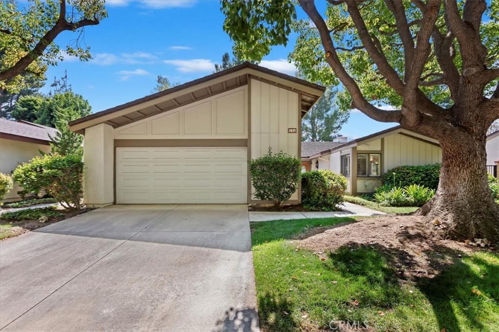 Welcome Home... This lovely single story home is nestled in the heart of the highly sought after "Canyon Hills" community located in Canyon Crest. Upon entering the community you immediately sense the tranquility and serenity of this well-manicured neighborhood. Perfect for Relaxed & Elegant Living Just moments from the Canyon Crest Country Club and lively Town Center, you'll enjoy effortless access to dining, shopping, and entertainment, all while being surrounded by breathtaking natural beauty.
Inside, this thoughtfully designed two-bedroom, two-bathroom home offers an ideal balance of comfort and style. The family room takes center stage with a walk-behind wet bar with granite countertops, creating the perfect setting for entertaining guests or unwinding with a drink or glass of wine in hand. Cozy up by the fireplace in the spacious living room or enjoy the seamless indoor-outdoor flow leading to three private patios, each offering picturesque views of mature trees and lush hillsides.
The primary suite is a true sanctuary, featuring generous space and a private patio—your own serene escape to enjoy morning coffee or unwind in the fresh air. A well-equipped laundry room with utility sink adds practicality to the home's thoughtful layout.
With its peaceful ambiance and prime location, this Canyon Crest gem offers a lifestyle of sophistication and ease. Don't miss the opportunity to make it your own!