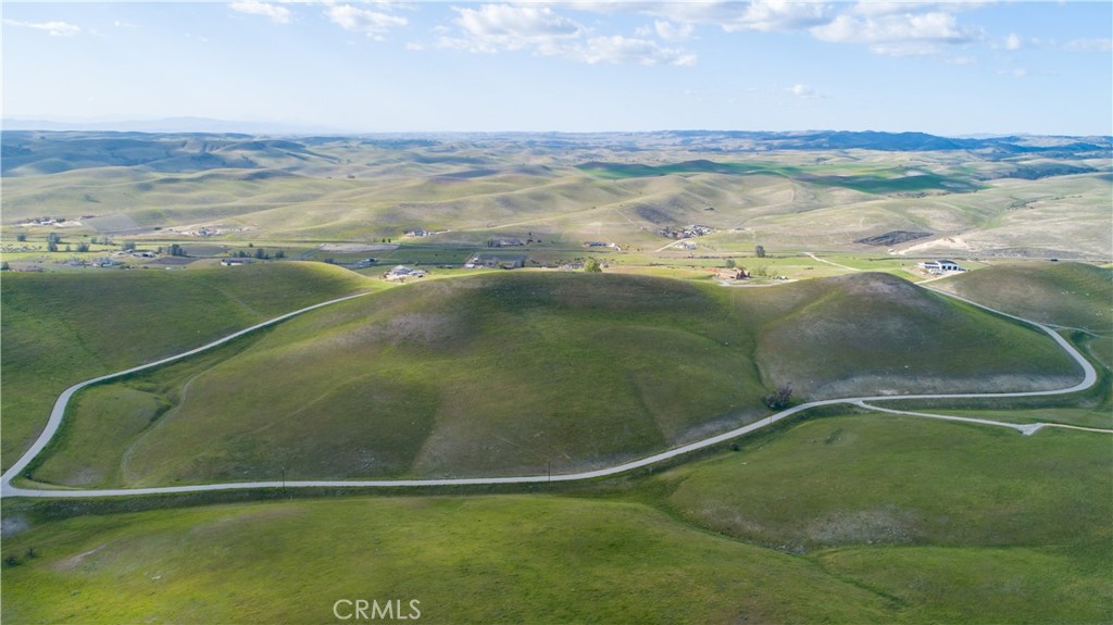 Charming 10.78± Acre Parcel (Lot 43) with Expansive Views in King Ranch
This 10.78± acre parcel offers a serene setting in the highly sought-after King Ranch area, ideal for those seeking privacy, breathtaking views, and a tranquil countryside lifestyle. The land is gently rolling, with an ideal westward orientation that promises stunning sunsets and peaceful evenings.
Accessed via a paved road, this property is ready to build, with utilities (power and phone) available at the lot line. It backs up to a large private ranch, ensuring a quiet and secluded atmosphere. Just 25 minutes from downtown Paso Robles and only 10–15 minutes from renowned wineries, this parcel offers the perfect balance of rural charm and modern convenience.
This is one of six adjacent parcels available, providing excellent potential for a family estate, vineyard, or development project.