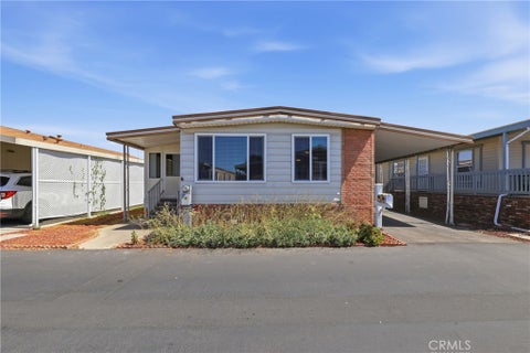 Photo of 1201 W Valencia Drive DR #69, Fullerton, CA 92833 (MLS # OC26171832)