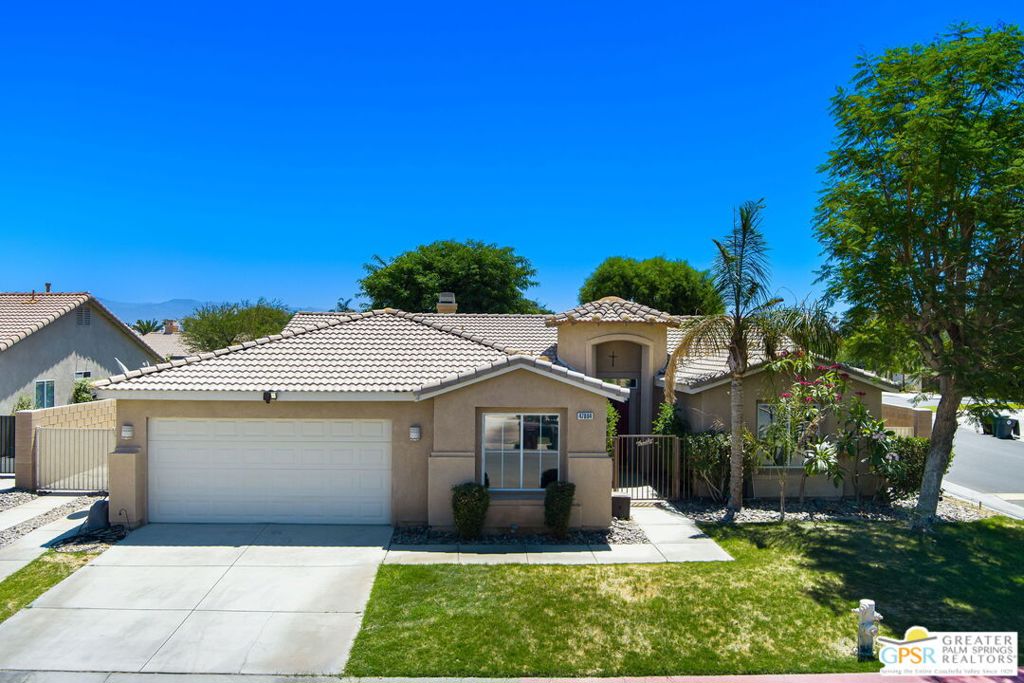 Welcome to Avocado Ct in the gated community of Las Brisas North. This 4-bedroom, 3-bathroom home presents a rare opportunity to build equity and is customizable to your vision. The primary bedroom offers privacy and convenience with its own wing, walk in closet and sliding door to the outdoor patio. The well-designed floor plan separates formal dining and living areas, a separated casita with full bathroom and a kitchen with breakfast bar, creating a great layout for entertainment. Situated on a generous lot, the property offers ample space for a future pool, landscaped gardens, and has gated extra parking. With a low HOA fee and a prime location just off Madison Street and Highway 111, you'll enjoy convenient access to all areas of the Coachella Valley. An ideal choice for buyers seeking a well-located home with both current comfort and future potential.