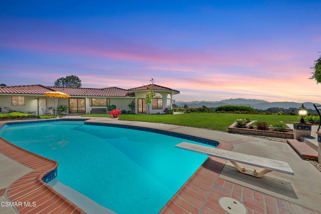 Wow! One-of-a-kind, single story, secluded and privately gated beauty with awe-inspiring expansive view. Goregous landscaping with an abundance of rare flowers and an amazing variety of fruit trees. Lovely pool and spa surrounded by generous lawn and patios. 3 Bedrooms plus an office. 2 1/2 baths. NO STAIRS! Gleeminng wood floors in many rooms. Great room design . Primary bedroom open to stunning view and garden. Walk-in closet. Separate laundry room. Convenietly located near schools, restaurants, stores and Permforing Arts Center. Don't dilly dally on this one!