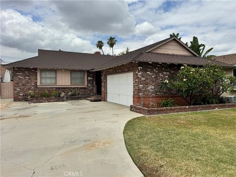 Photo of 10229 Julius AVE, Downey, CA 90241 (MLS # DW26116708)