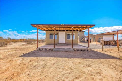 Photo of 69589 Presswood Road, 29 Palms, CA 92277 (MLS # 219150483DA)