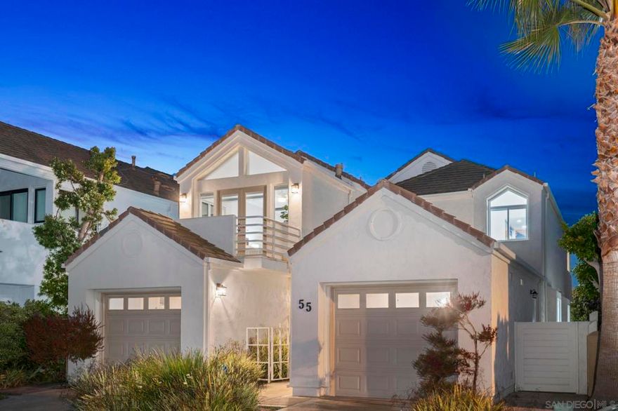 55 Spinnaker Way — where luxury meets the water's edge.  A rare jewel in the prestigious Coronado Cays, 55 Spinnaker Way presents a once-in-a-lifetime opportunity to own a sophisticated waterfront estate that defines Southern California luxury. This immaculate, turn-key residence spans 2,666 sqft and features 3 bedrooms, 2.5 baths, and unobstructed, front-row views of the iconic San Diego Bay.  Tucked within a quiet, private enclave, this home offers more than just exceptional design — it delivers an unmatched sense of tranquility and exclusivity. The moment you step inside, you are enveloped in serene coastal elegance, where floor-to-ceiling glass captures breathtaking water vistas and floods the interiors with natural light.  At high tide, the bay becomes an extension of your backyard, gently lapping against the seawall. At low tide, enjoy your very own private, walkable beach — an extraordinary amenity rarely found in coastal homes. This seamless connection to the water creates an ever-changing canvas that is both peaceful and captivating. Designed for both refined entertaining and intimate daily living, the open-concept layout flows effortlessly.  Located in one of the only communities in Southern California offering both bay and beach access within steps of each other, the Coronado Cays delivers a lifestyle of rare privilege. Whether you’re boating, paddle boarding, or walking along the oceanfront, every detail of this coastal sanctuary speaks to elevated living.