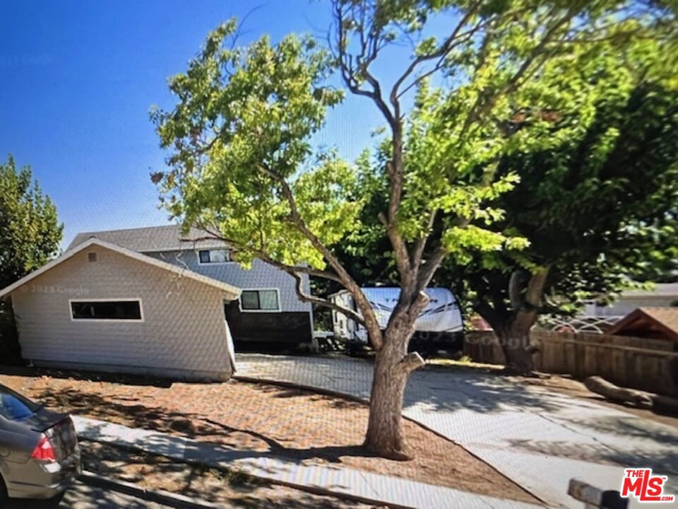 Welcome to 2660 Calle Abedul, a hidden gem in the heart of Thousand Oaks. Set on an expansive 16,117 sq ft lot in a tranquil and established neighborhood, this charming single-family residence offers comfort, space, and exceptional potential. With 3 spacious bedrooms and 2 full bathrooms across 1,377 sq ft of thoughtfully designed living space, this home provides an ideal canvas for a variety of lifestyles. Whether you're a young family looking to plant roots in one of Thousand Oaks' most sought-after communities, or an investor seeking value-add upside due to the large lot size, this property delivers. The lot size alone opens the door to future expansion, ADU development, or the creation of a stunning backyard oasis. Surrounded by mature trees, the home enjoys a natural canopy that enhances privacy and creates a serene, picturesque setting. Located in the highly acclaimed Conejo Valley Unified School District, this home is zoned for top-performing schools Weathersfield Elementary (8/10), Los Cerritos Middle School (7/10), and Thousand Oaks High School (8/10) making it a perfect fit for families prioritizing education. Built in 1973, the residence exudes timeless curb appeal and includes an attached two-car garage, a long driveway with ample parking, and a quiet, residential setting. The spacious rear yard offers endless possibilities for entertaining, gardening, or custom upgrades to make the most of the California lifestyle. Just minutes from parks, hiking trails, shopping, dining, and easy freeway access, 2660 Calle Abedul balances convenience with comfort in a location that continues to grow in value. Don't miss this rare opportunity to own a well-located home with room to live, expand, and invest in the future.