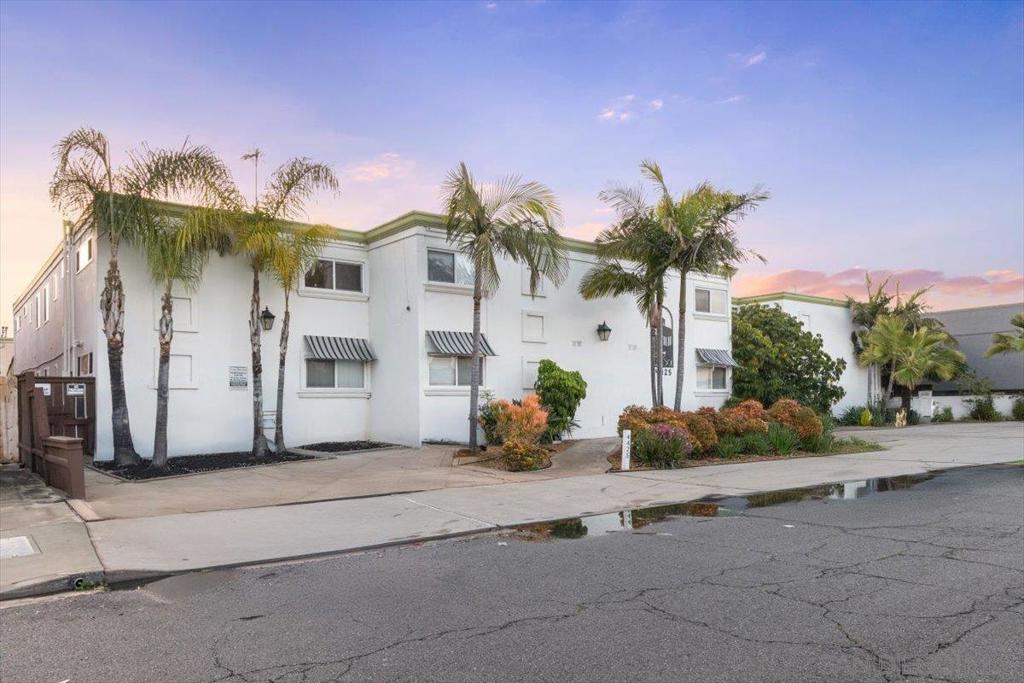 Beautifully updated ground level unit and perfect for anyone working from home with its built in desk space! Kitchen features granite, SS appliances: gas range, microwave, disposer and fridge. Walk-in shower w/ rain-shower shower head and dual sinks. Fenced in back patio, In-wall AC units front & back. Easy maintenance ceramic tile flooring, stylish wall treatment in LR with space conscious built-in storage system. Easy walk to shops, restaurants, etc. on El Cajon Blvd. and easy access to I-8 and I-15.