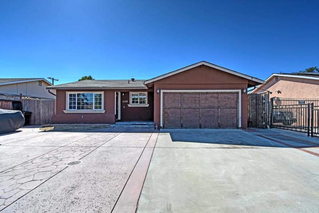 Welcome to this charming home in the East Valley, in desirable Cassell neighborhood. Featuring a warm, rustic style that highlights the home's natural beauty, this spacious property offers comfort, character, and convenience. Step inside to find neutral-toned paint, gleaming hardwood floors, and a cozy, rustic-style kitchen. The home includes 3 original bedrooms and 2 full bathrooms, plus a wonderful second master suite with a private entrance to the backyard, perfect for guests, extended family, or rental potential. The garage has also been converted into an additional bedroom, providing even more living space. Enjoy a large backyard ideal for entertaining, along with a stamped concrete driveway that offers parking for up to four vehicles and boat/toy parking. With easy access to highways 680 and 280, major shopping centers, and other local amenities, this is a fantastic opportunity for families or anyone looking for a spacious, move-in-ready home in a great location.