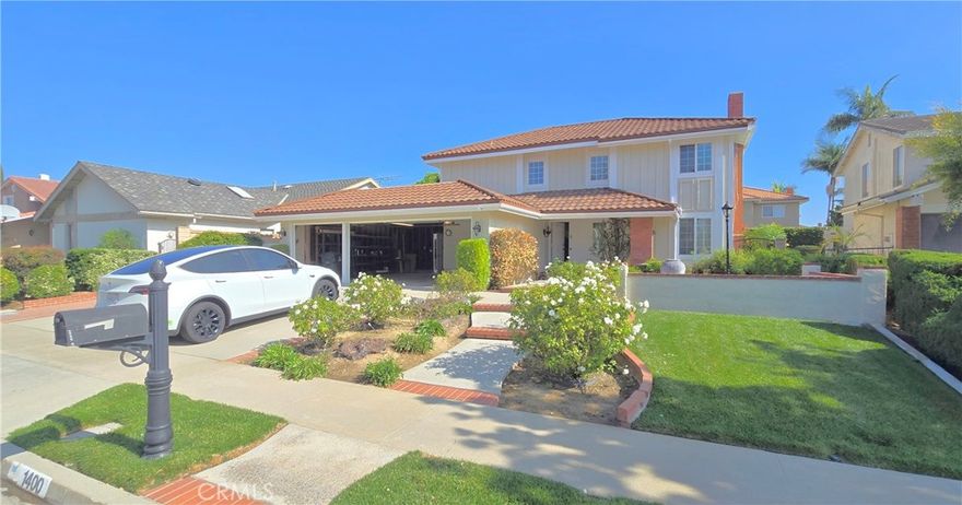 Discover this beautifully maintained 4-bedroom, 2.5-bathroom home in one of Fullerton’s most desirable neighborhoods! With 2,369 square feet of bright, open living space, this home offers plenty of room for comfortable living and entertaining.

Enjoy a welcoming front porch with a peaceful fountain and decorative lighting. Inside, the sunken living room features a cozy fireplace and large windows that fill the space with natural light. The kitchen includes stainless steel appliances, double ovens, an electric cooktop, and plenty of cabinet space—opening to the family room and casual dining area for easy gatherings.

Upstairs, the spacious primary suite includes dual vanities and a walk-in shower. Three additional bedrooms provide ample space for family, guests, or a home office. The backyard is perfect for relaxing with its covered patio, mature landscaping, and a lovely orange tree, plus a side patio with a gas line for BBQs.

Additional features include a 3-car garage, hardwood floors, porcelain tile, inside laundry room, copper plumbing, crown molding, a steel roof, and updated HVAC. Close to Sunny Hills High School, Fisler K–8, Los Coyotes Country Club, shopping, and dining—this Fullerton gem won’t last long.