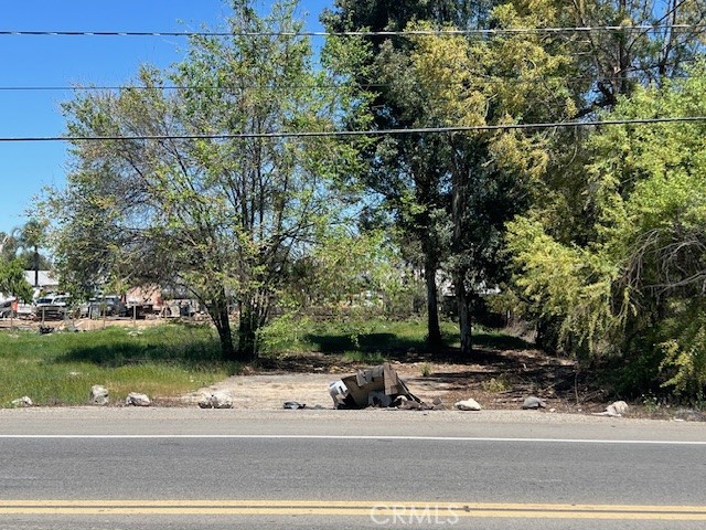 Great opportunity for investment and great location with existing homes across the street already. Tomas Rivera middle school less than a mile and a half away. Electricity and water at main street. All offers will be entertained. property is across the street from 20673 Cajalco Rd