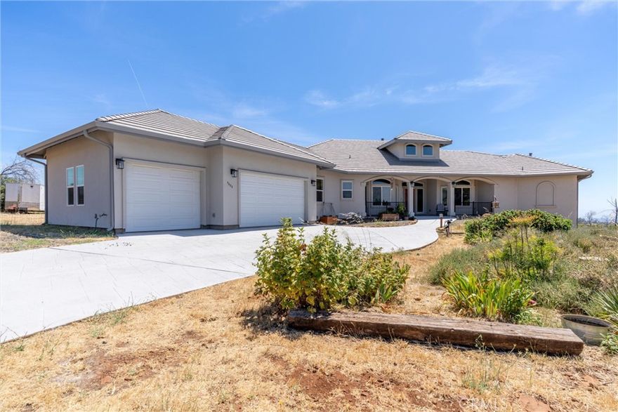 Stunning Custom View Estate on 20 Acres with Pool, Solar & More!
Welcome to your dream retreat just outside the charming town of Paradise! This nearly new, custom-built 2023 estate is a rare gem offering an incredible blend of elegance, space, and self-sufficiency — all set on a private, usable 20-acre parcel with panoramic views that stretch across the valley to the distant coastal mountains.
With 4 spacious bedrooms, a dedicated home office, and 3 bathrooms, this 3,001 sq ft home was thoughtfully designed to combine classic style with modern touches. Step inside and you’ll be greeted by a light-filled great room with soaring ceilings, a cozy fireplace, and a seamless flow into the stunning kitchen and dining areas. The kitchen is ideal for both everyday living and entertaining, boasting ample counter space, high-end finishes, and views that will inspire every meal.
Enjoy sunsets from the inviting covered front porch or bask in natural light from the exceptional sunroom, perfectly positioned to soak in the sweeping views. Just outside, you'll discover your own private oasis — a gorgeous in-ground pool with fencing around the pool and deck area for added safety and peace of mind.
This property offers features that go well beyond the ordinary, including:
• Owned solar system for energy efficiency
• 18KW backup generator for uninterrupted power
• Private well and well-house, providing reliable and independent water supply
• Culligan Water Softener and Reverse Osmosis Water System
• Oversized garage and a massive under-home storage area
• Private Primary Suite Balcony
• Durable concrete tile roof, beautiful tile work, and wood laminate flooring throughout
• Low maintenance stucco exterior and concrete walkways
• A large greenhouse structure, ready for your finishing touches
• Room for an ADU or Ample RV Parking
• Ample space and opportunity for horses, goats, or other livestock
Whether you’re dreaming of a private family compound, a hobby farm, or simply more room to breathe, this property delivers. All of this is conveniently located near the Paradise Airport, with an easy commute to Chico or Oroville, and close to Lake Oroville, hiking trails, kayaking, biking, and more.
This is truly a one-of-a-kind home that offers unmatched views, luxury living, and room to live the Northern California lifestyle to the fullest.
Don’t miss your chance to own this extraordinary Paradise property — schedule your private tour today!