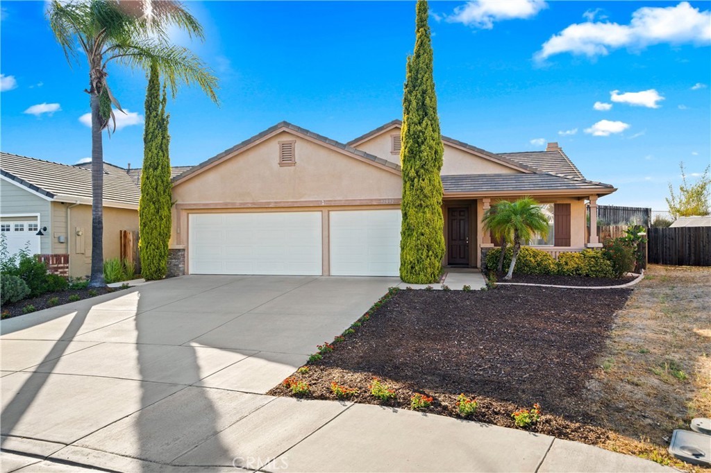Experience the perfect blend of comfort, style, and the quintessential Temecula lifestyle in this beautifully maintained single story home, ideally located in the heart of Wine Country. Situated in a serene and desirable neighborhood, this 4 bedroom and 2 bathroom gem offers a spacious open floor plan with abundant natural light and thoughtful design throughout. As you step inside, you’ll be greeted by vaulted ceilings, large windows, and a seamless layout that flows effortlessly from the formal living space to the kitchen and family room, perfect for both entertaining and everyday living. The kitchen features plenty of cabinet space, a breakfast bar, and a cozy dining nook that overlooks the backyard. The primary suite is your private retreat, offering a large walk-in closet and ensuite bathroom with dual sinks, a soaking tub, and separate shower. Three additional bedrooms provide flexible space for family, guests, or a home office. Keep cool this summer with a Brand New HVAC system installed in July 2025. . Step outside to the low-maintenance oversized backyard. With no homes behind you, and the placement on the cul de sac, it is very private. Whether you are entertaining, gardening, or relaxing in the California sun, this backyard offers the perfect setting to enjoy outdoor living year-round. Additional features include, a 3 car garage with ample storage, an EV charger, no HOA and low taxes. Live minutes from award-winning wineries, scenic hiking trails, golf courses, and Old Town Temecula's charming boutiques and dining. Top-rated schools, family-friendly parks, and easy freeway access make this location ideal for commuters and lifestyle seekers alike.
Whether you're sipping wine on the patio or enjoying the vibrant local culture, 32032 Merlot Crest is more than a home — it’s your gateway to the best of Temecula living.