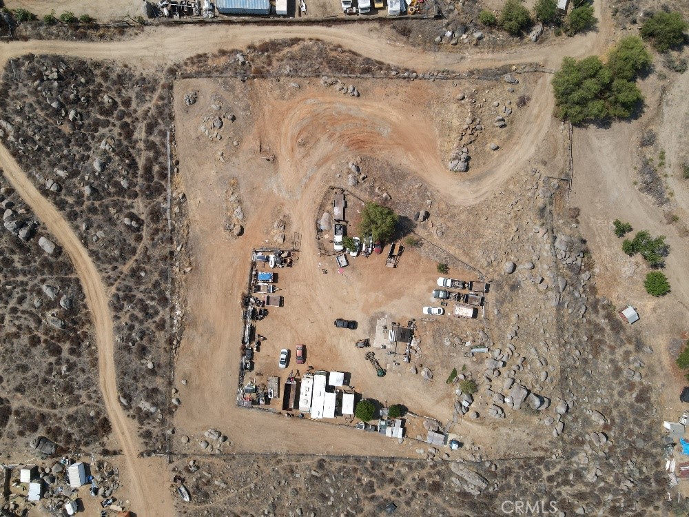 This 2.5-acre lot (approx. 108,900 sq ft) offers endless potential in a peaceful rural setting surrounded by rolling hills and natural boulders. The property features a large cleared area, partial fencing, and plenty of space for building a home, creating a ranch, or using for agricultural and recreational purposes. Enjoy privacy and open space while still being just a short drive to local amenities, schools, and major highways.