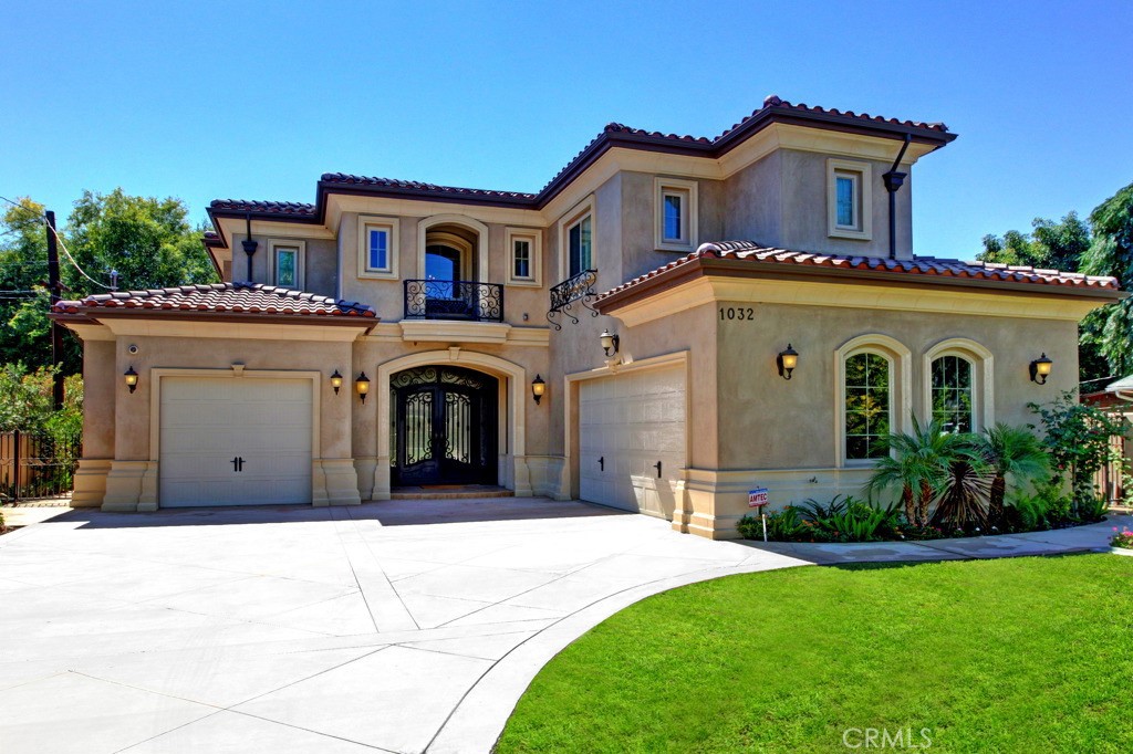 Luxury Estate in Prestigious Arcadia School District — This exceptional residence blends timeless elegance with modern luxury, featuring sophisticated chandelier lighting, intricate crown molding, and gleaming marble floors throughout. The expansive family room is designed for upscale entertaining, with a custom-built entertainment center, sleek wet bar, coffered ceilings, and double French doors that open to a beautifully landscaped, oversized backyard. The gourmet chef’s kitchen is a true centerpiece, boasting top-of-the-line built-in stainless steel appliances, handcrafted cabinetry, a grand center island adorned with exotic natural stone, and exquisite designer tilework, complemented by a spacious walk-in pantry and separate workroom. The home offers two luxurious bedroom suites on the main level and three additional suites upstairs, including an extraordinary primary retreat featuring a spa-caliber bathroom with a Jacuzzi tub, steam shower, and an expansive vanity area. Ideally located just moments from fine dining, upscale shopping, and premier attractions, this private estate delivers both refined living and coveted privacy—set within the award-winning and highly acclaimed Arcadia School District.