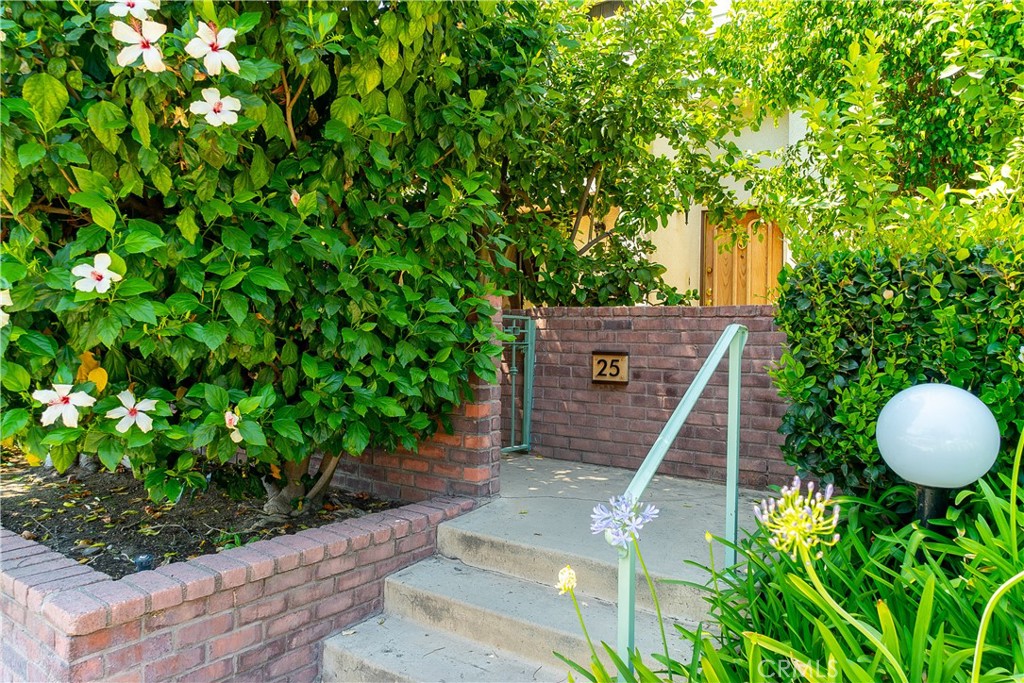 Welcome to your dream home in the resort-style community of Tarzana Courts!
This small, exclusive enclave of just 58 townhomes offers everything you need for a tranquil and secure lifestyle, including lush landscaping, a sparkling pool and spa, a clubhouse, and a tennis court.
This exquisite 3-bedroom, 2.5-bath townhome features 2,023 square feet of beautifully designed living space with soaring vaulted ceilings, skylights, recessed lighting, and elegant designer touches throughout.
Step into the spacious and inviting living room, where a grand fireplace sets the perfect ambiance for entertaining guests or enjoying a cozy evening at home. A stylish free-standing bar adds a touch of charm and convenience.
The chef’s kitchen is a true delight, complete with built-in appliances and a charming formal dining area ideal for hosting dinner parties or enjoying everyday meals.
The luxurious primary suite offers a private retreat with a walk-in closet, built-in storage, and a spa-like en-suite bath featuring a gorgeous double vanity. Step out onto your private balcony for a breath of fresh air.
Two additional generously sized bedrooms provide comfort and privacy for family or guests. The two-car attached garage includes a convenient laundry area and a small fitness space.
Enjoy the serene outdoor patio—perfect for al fresco dining or simply unwinding in your own peaceful oasis.
Located just minutes from the 101 Freeway and a short stroll to vibrant Ventura Blvd., you'll enjoy easy access to trendy cafes, boutique shopping, and fantastic dining.
Don't miss your chance to make this stunning townhome your own—schedule a tour today!