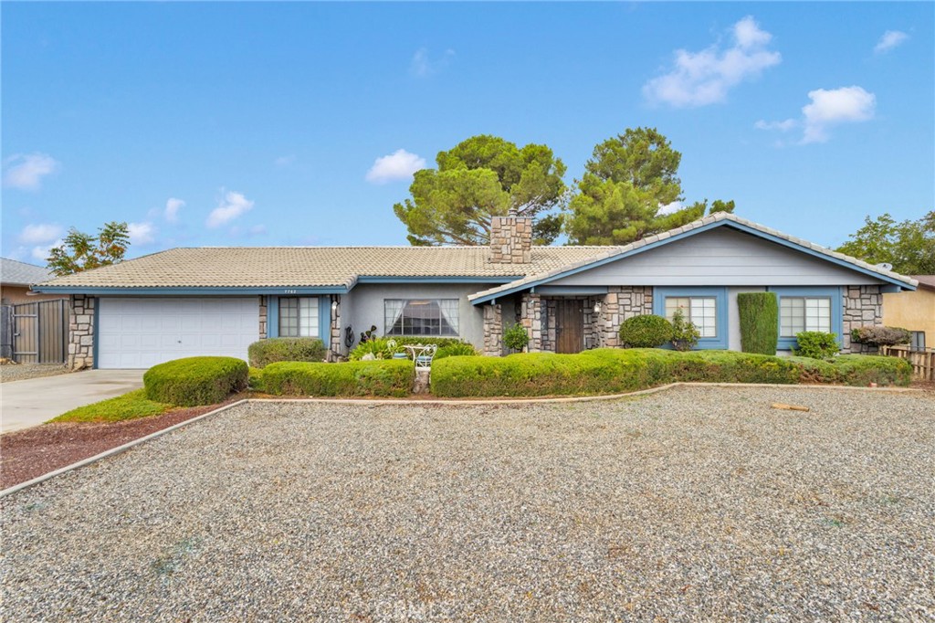 Welcome to this charming Hesperia home on The Mesa! Situated on a spacious 18,000 sq ft lot, this property offers plenty of room to enjoy desert living with a beautifully maintained desertscape front yard that provides fantastic curb appeal.
Inside, you’ll find a thoughtfully designed layout featuring a family room and a great room with a cozy wood-burning stove as well as soundproof office with a new mini-split for year-round comfort. Perfect for gatherings and quiet evenings at home.
Outside, the property is packed with extras that make it truly unique — the detached 2-car garage offers additional parking or workshop space, while the chicken pen with misters and attached storage shed are ideal for animal lovers or hobbyists. RV parking /Dump hook up. 120 & 240V in front and back garage. Additional features include: Solar, Irrigation system neatly tucked inside a deck box. Concrete bench by the front door. Patio misters to keep cool on warm days.
With multiple living spaces, functional upgrades, and plenty of room for toys, animals, and outdoor gatherings, this Mesa home combines convenience, comfort, and country charm.
