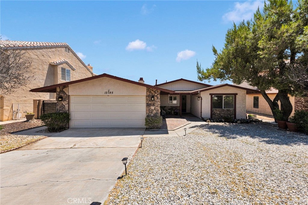 Photo of 12785 Autumn Leaves Avenue, Victorville, CA 92395 (MLS # HD26129655)